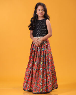 Black Mirror Top With Red Patola Skirt